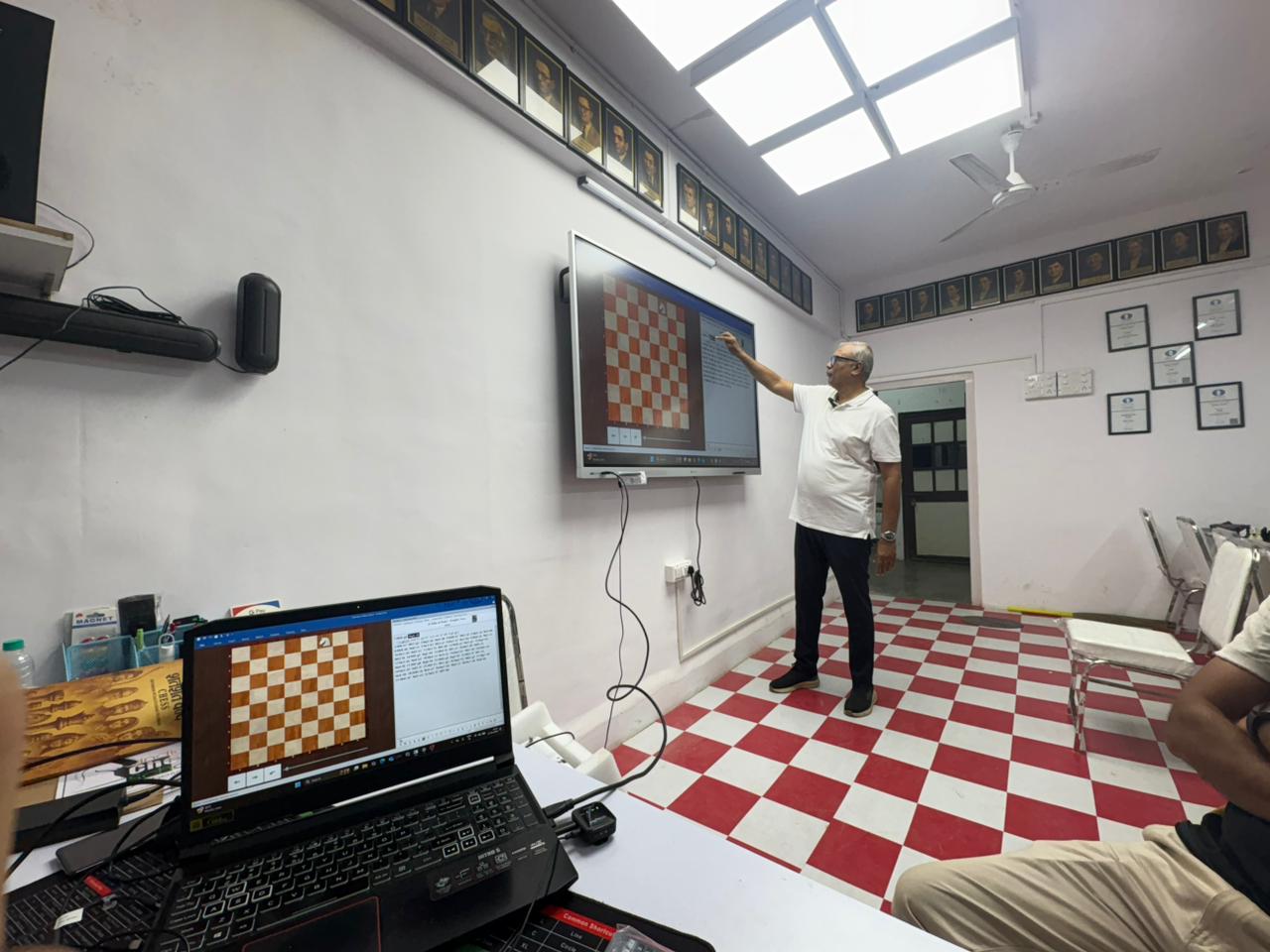 Chess instruction at the ICS Borivali classroom